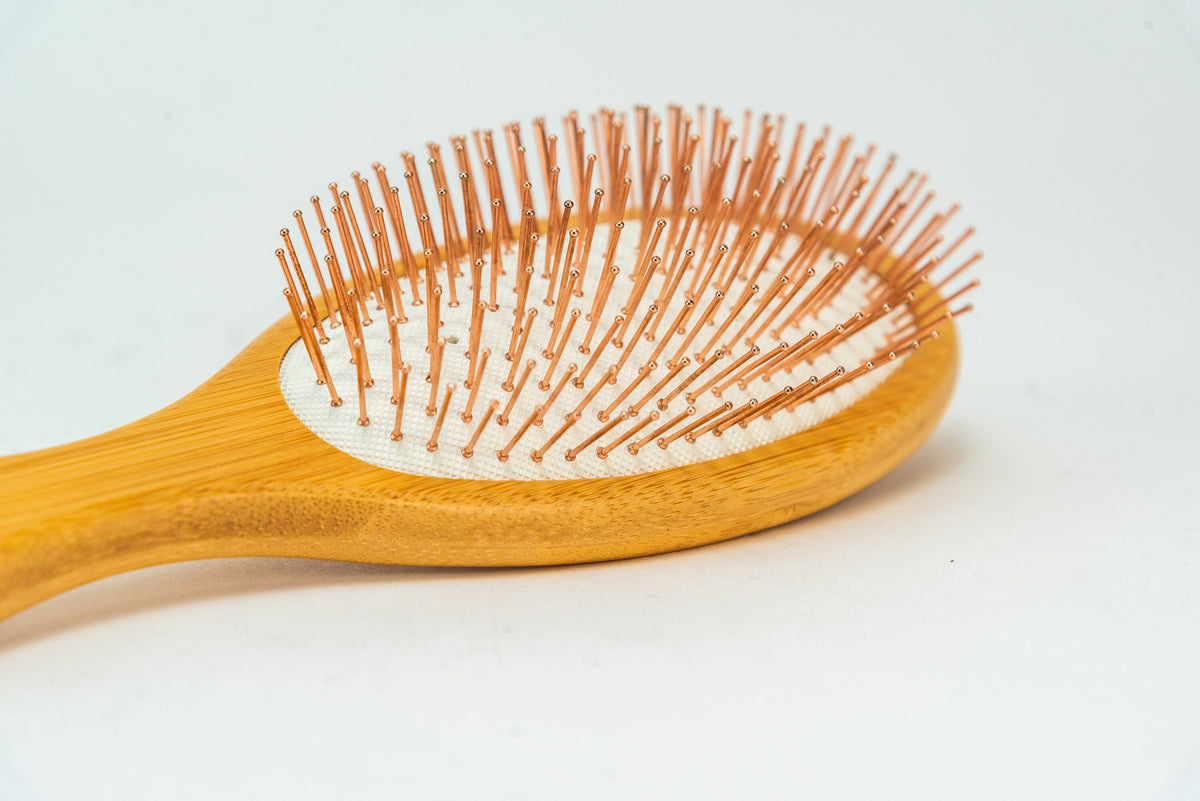 Close view of the copper-coated bristles on the bamboo brush